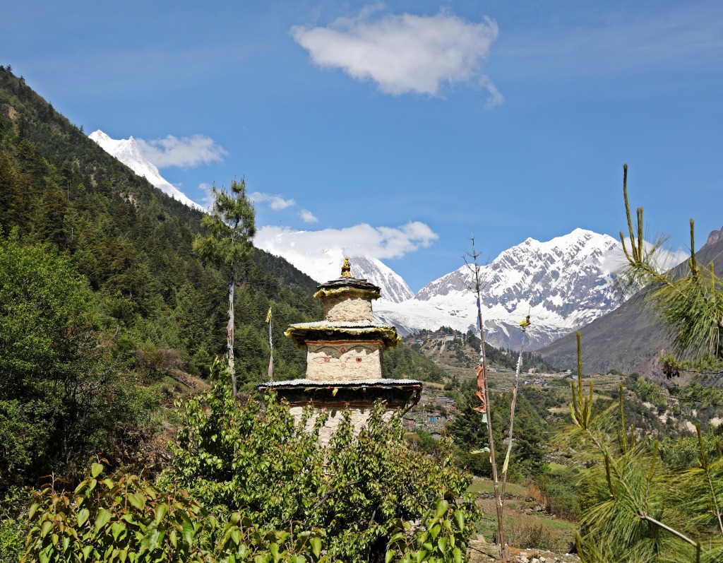 Mt Manaslu (far left) and the village of Lho