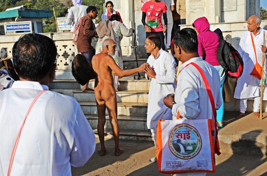 Jain priest greeting a devotee, Parasnath Hills