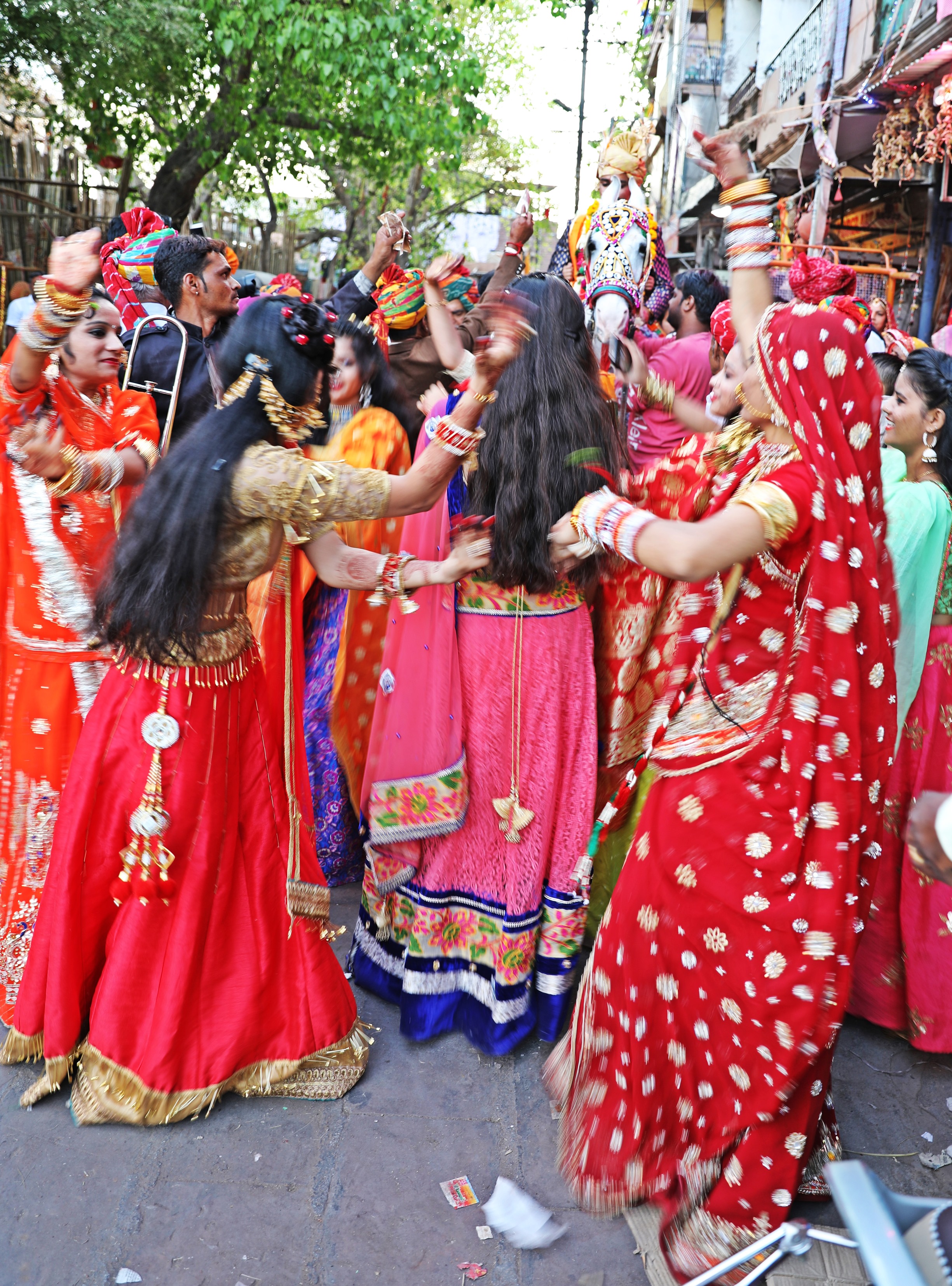 Women dancing in front of the groom on horseback, Jodhpur