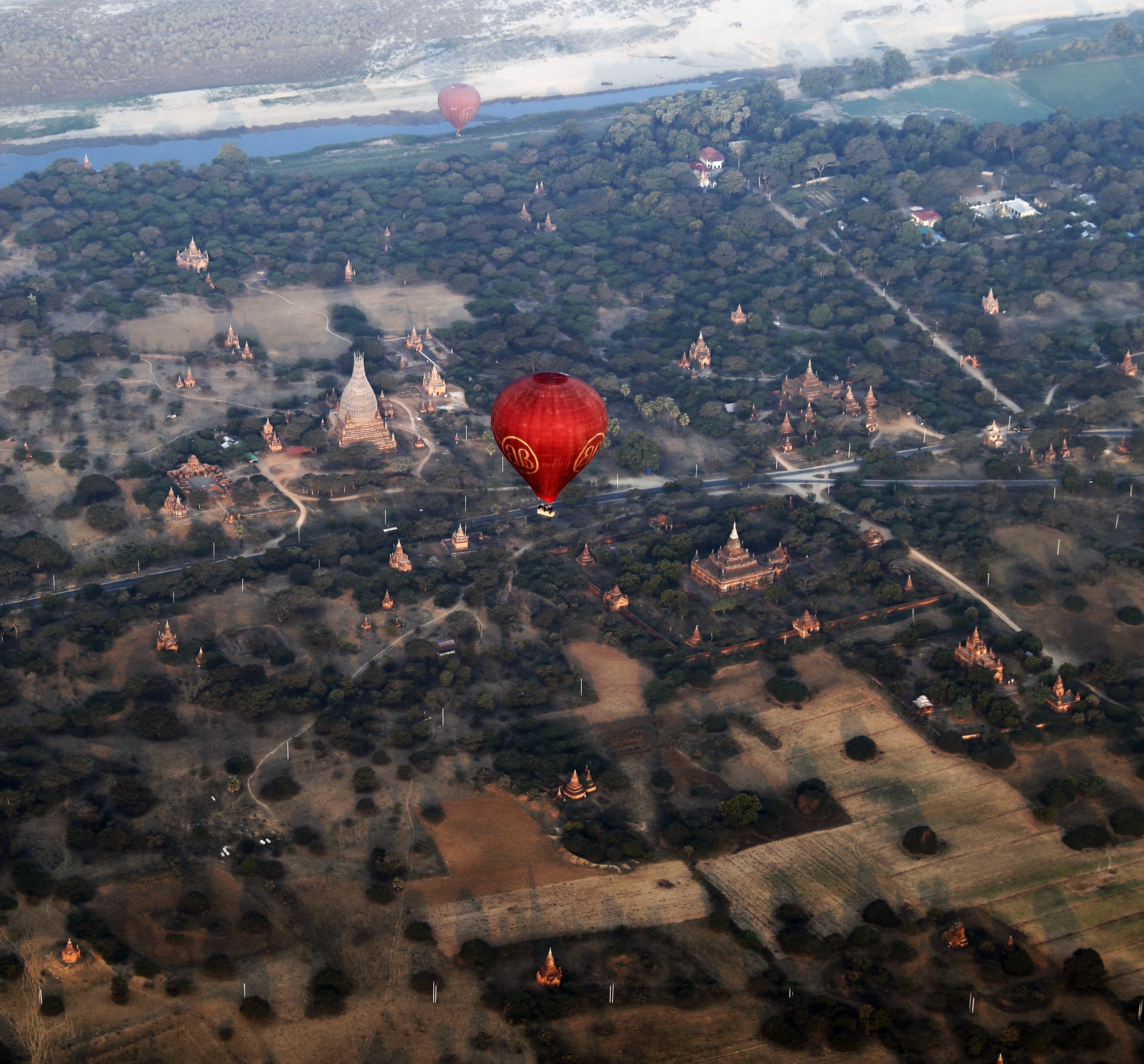 Hot air balloons over ancient temples in Bagan